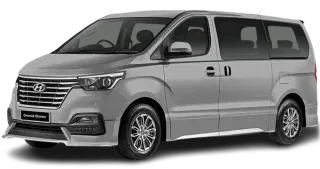 Silver Hyundai Starex for Rana Transportation Hajj & Umrah Taxi Service and 7-seat family pilgrim transport.
